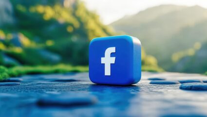 Facebook logo standing on blue background with copy space